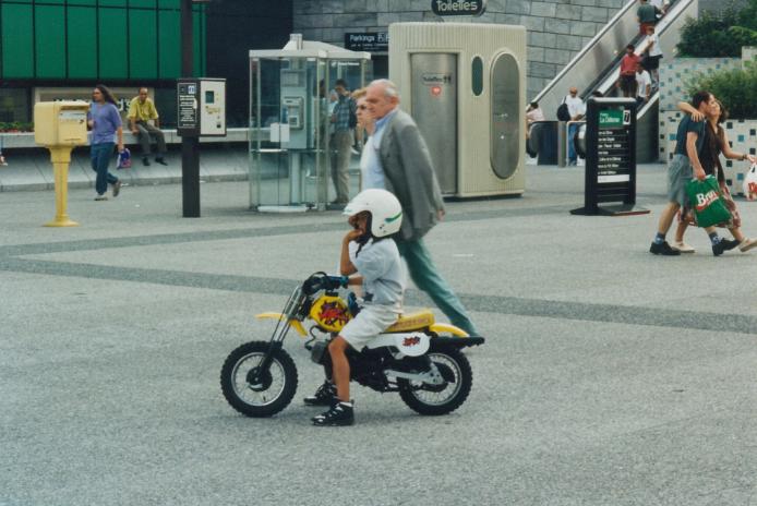 S_06440-MinibikeKidInCity.jpg