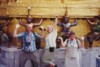 S_00310 - TEB Bridget Mom Dad Pose with Statues.jpg