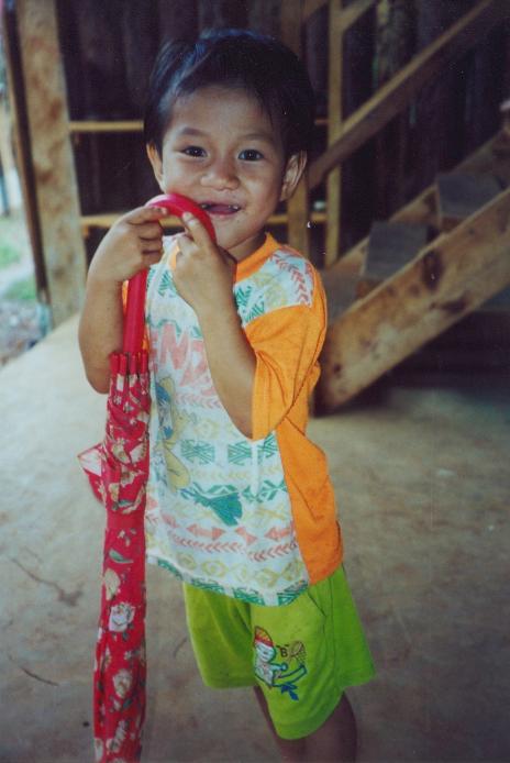 S_04170 - Village Child & Umbrella.jpg